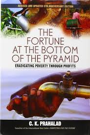 The Fortune at the Bottom of the Pyramid: Eradicating Poverty Through Profits Hardcover by C.K. Prahalad